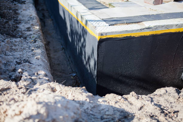 Professional Waterproofing technician working in Westfield, PA